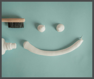 toothpaste and toothbrush smiley face